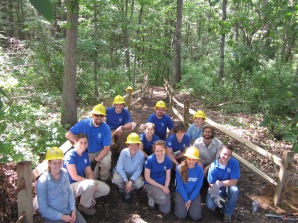 SCA Hudson Valley AmeriCorps members are all smiles after completing a new section of trail including split rail fencing at Saratoga Spa State Park.