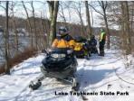 Snowmobiling at Lake Taghkanic State Park. Photo by OPRHP.