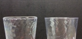 Surface tension in a glass of water: Left glass is filled over the rim with water, right glass is empty for comparison. Photo by Lilly Schelling, OPRHP