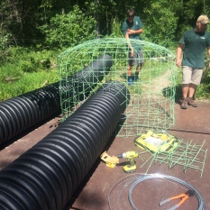 The deceivers, trapezoidal and pond leveling were completely constructed on land before they were placed into the water, photo by Lilly Schelling.